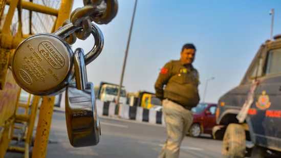 Global Eye : Bharat Bandh news: A police barricade secured with locks at Ghazipur border in Ghaziabad.